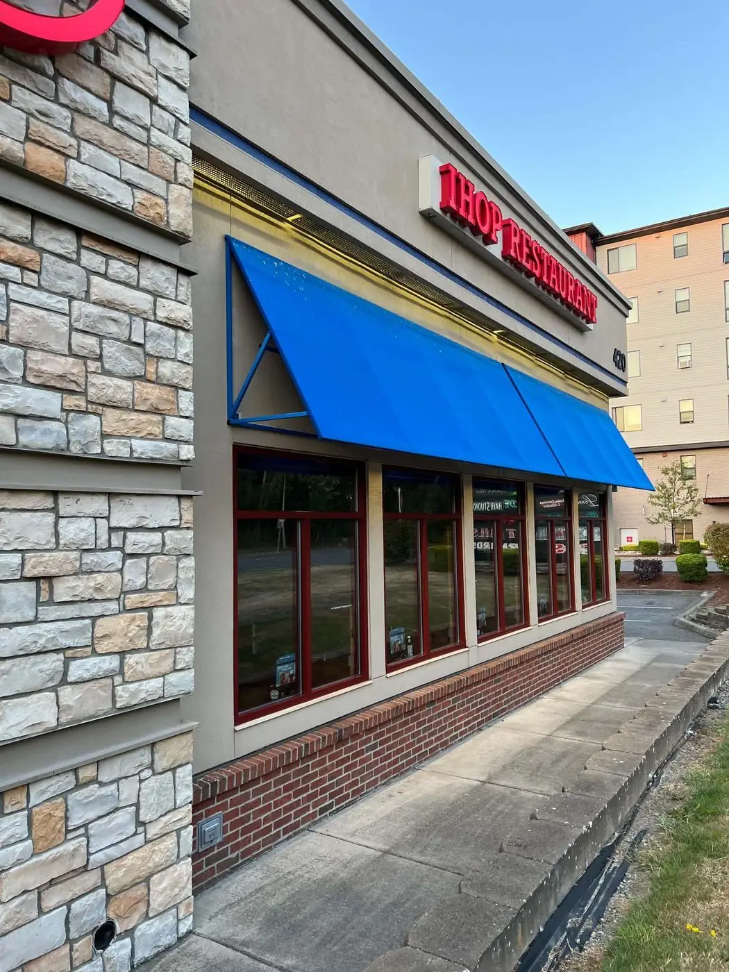Cleaned restaurant storefront windows and glass at a commercial location